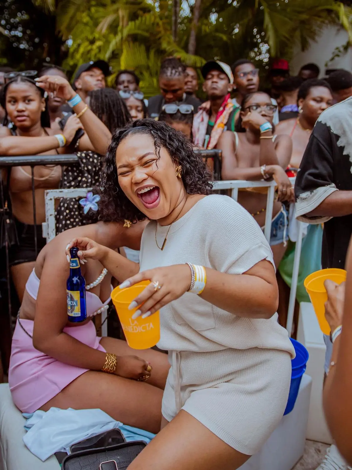 Friends socialising at an outdoor daytime event